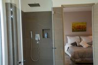 Posteľ alebo postele v izbe v ubytovaní Residence Villa Hedy