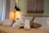 Posteľ alebo postele v izbe v ubytovaní Residence Villa Hedy
