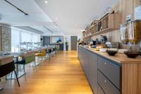 ATHOME RESIDENCE ET SPAにあるキッチンまたは簡易キッチン