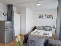 Kuchyňa alebo kuchynka v ubytovaní Apartmani Mali