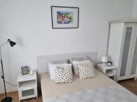 Posteľ alebo postele v izbe v ubytovaní Apartmani Mali