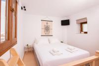 Postel nebo postele na pokoji v ubytování Whitelist Maisonette I and II in Mykonos Town