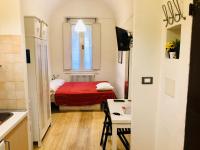 A bed or beds in a room at Appartamento Maggiore