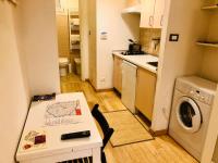 A kitchen or kitchenette at Appartamento Maggiore