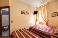 Posteľ alebo postele v izbe v ubytovaní Buonarroti Home