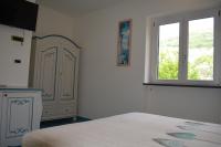 Posteľ alebo postele v izbe v ubytovaní B&B il vetraio