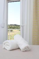 Posteľ alebo postele v izbe v ubytovaní Mare Monte Luxury Apartments 1