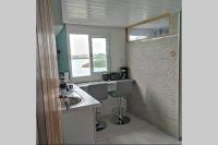 O bucătărie sau chicinetă la Studio lumineux vue exceptionnelle sur la mer