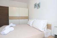 Posteľ alebo postele v izbe v ubytovaní Mare Monte Luxury Apartments 1