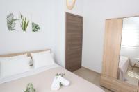 Posteľ alebo postele v izbe v ubytovaní Mare Monte Luxury Apartments 1