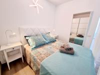 Posteľ alebo postele v izbe v ubytovaní Apartamento Luca 05 en Playa Roca