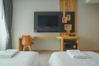 TV a/nebo společenská místnost v ubytování The Cotton Tree Hometel