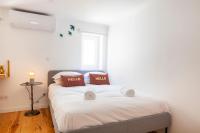 Postel nebo postele na pokoji v ubytování Lisbon Chillout Apartments