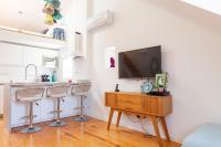 TV a/nebo společenská místnost v ubytování Lisbon Chillout Apartments