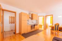 Kuchyň nebo kuchyňský kout v ubytování Appartements Avenzio