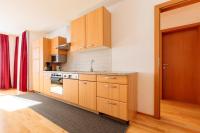 Kuchyň nebo kuchyňský kout v ubytování Appartements Avenzio