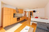 Kuchyň nebo kuchyňský kout v ubytování Appartements Avenzio
