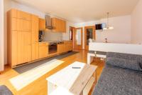 Kuchyň nebo kuchyňský kout v ubytování Appartements Avenzio