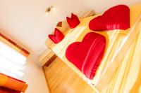 Postel nebo postele na pokoji v ubytování Appartements Avenzio