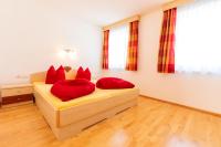 Postel nebo postele na pokoji v ubytování Appartements Avenzio