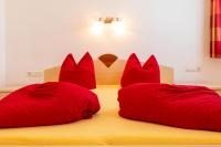 Postel nebo postele na pokoji v ubytování Appartements Avenzio