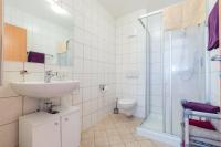 Koupelna v ubytování Appartements Avenzio