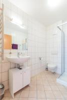 Koupelna v ubytování Appartements Avenzio