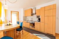 Kuchyň nebo kuchyňský kout v ubytování Appartements Avenzio