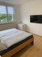 Postel nebo postele na pokoji v ubytování Apartmán Frymburk 30