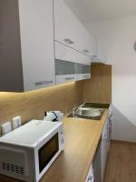 Kuchyň nebo kuchyňský kout v ubytování Apartmán Frymburk 30