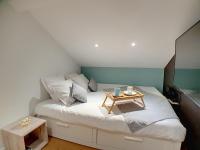 Llit o llits en una habitaci&oacute; de Stop Chez M Select Sense # Qualit&eacute; # Confort # Simplicit&eacute;