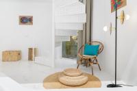 Łóżko lub łóżka w pokoju w obiekcie AquaBlanca Suite Chic Deluxe, en Punta Mujeres