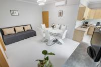 A kitchen or kitchenette at Fonyód Beach Apartment