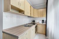 A kitchen or kitchenette at Fonyód Beach Apartment
