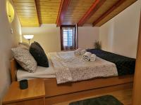 Posteľ alebo postele v izbe v ubytovaní Apartment Orkić
