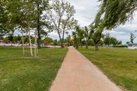 A garden outside Fonyód Beach Apartment