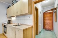 A kitchen or kitchenette at Fonyód Beach Apartment