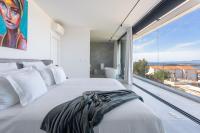 Posteľ alebo postele v izbe v ubytovaní Infinity Residence