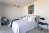Posteľ alebo postele v izbe v ubytovaní Infinity Residence