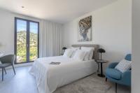 Posteľ alebo postele v izbe v ubytovaní Infinity Residence