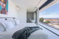 Posteľ alebo postele v izbe v ubytovaní Infinity Residence