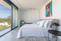 Posteľ alebo postele v izbe v ubytovaní Infinity Residence
