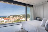 Posteľ alebo postele v izbe v ubytovaní Infinity Residence