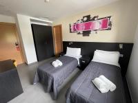 Posteľ alebo postele v izbe v ubytovaní 6 Bis HOTEL
