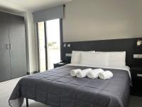 Posteľ alebo postele v izbe v ubytovaní 6 Bis HOTEL