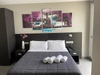 Posteľ alebo postele v izbe v ubytovaní 6 Bis HOTEL
