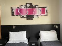 Posteľ alebo postele v izbe v ubytovaní 6 Bis HOTEL