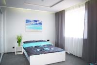 Posteľ alebo postele v izbe v ubytovaní Apartament U Bosmana