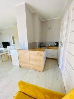 Kuchyňa alebo kuchynka v ubytovaní Apartamenty Różany Ogród
