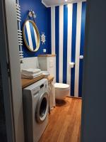Kúpeľňa v ubytovaní Apartament Słoneczne Giżycko